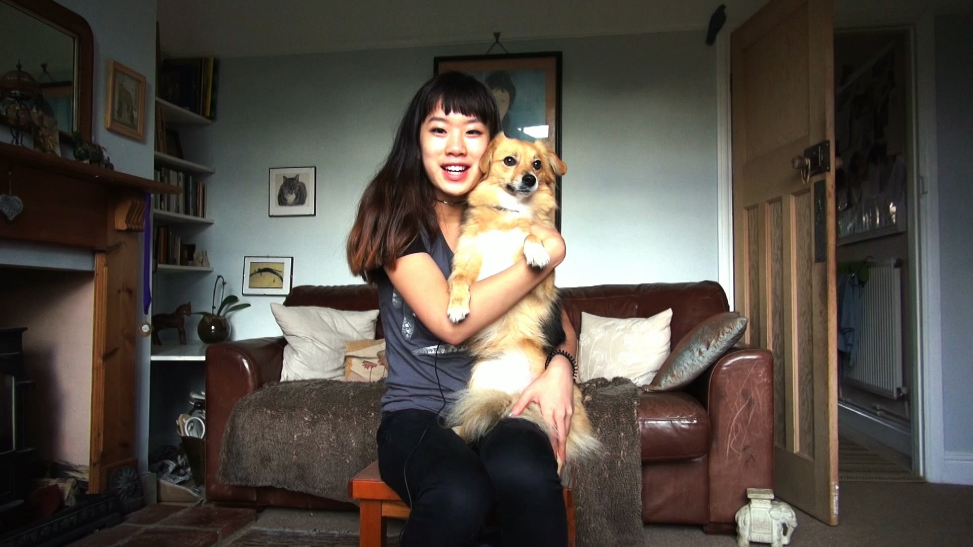 My Life: Adopted from China - girl holding pet dog