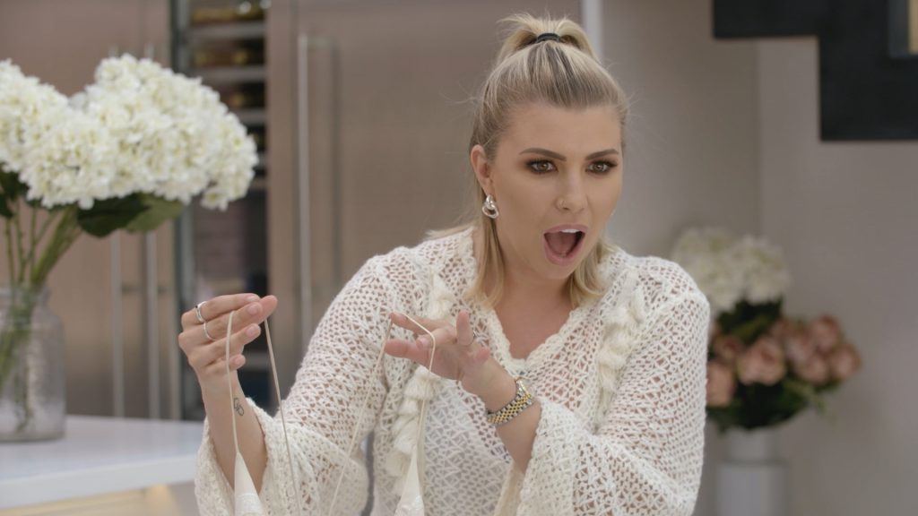 Second Chance Dresses - Olivia Buckland shocked face with wedding dress